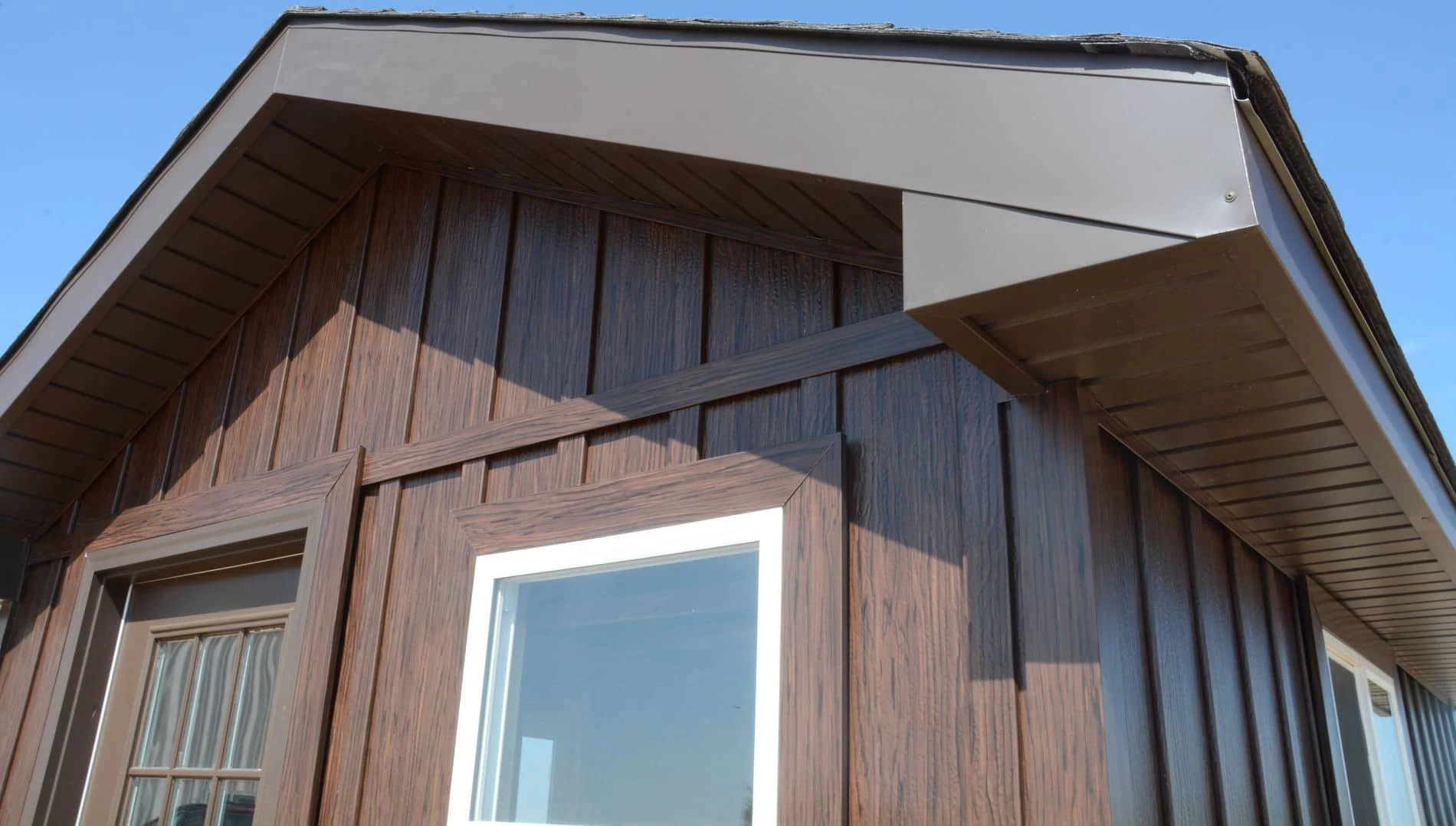 TruLog Dark Walnut board and batten siding closeup
