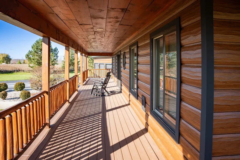 TruLog steel log siding porch with woodgrain detail